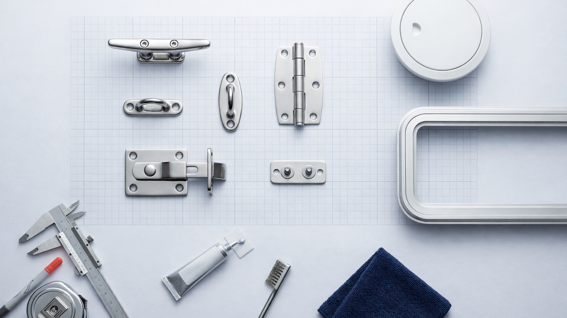 Illustration showing marine hardware such as: Deck Fittings, Hatches & Rail  Systems